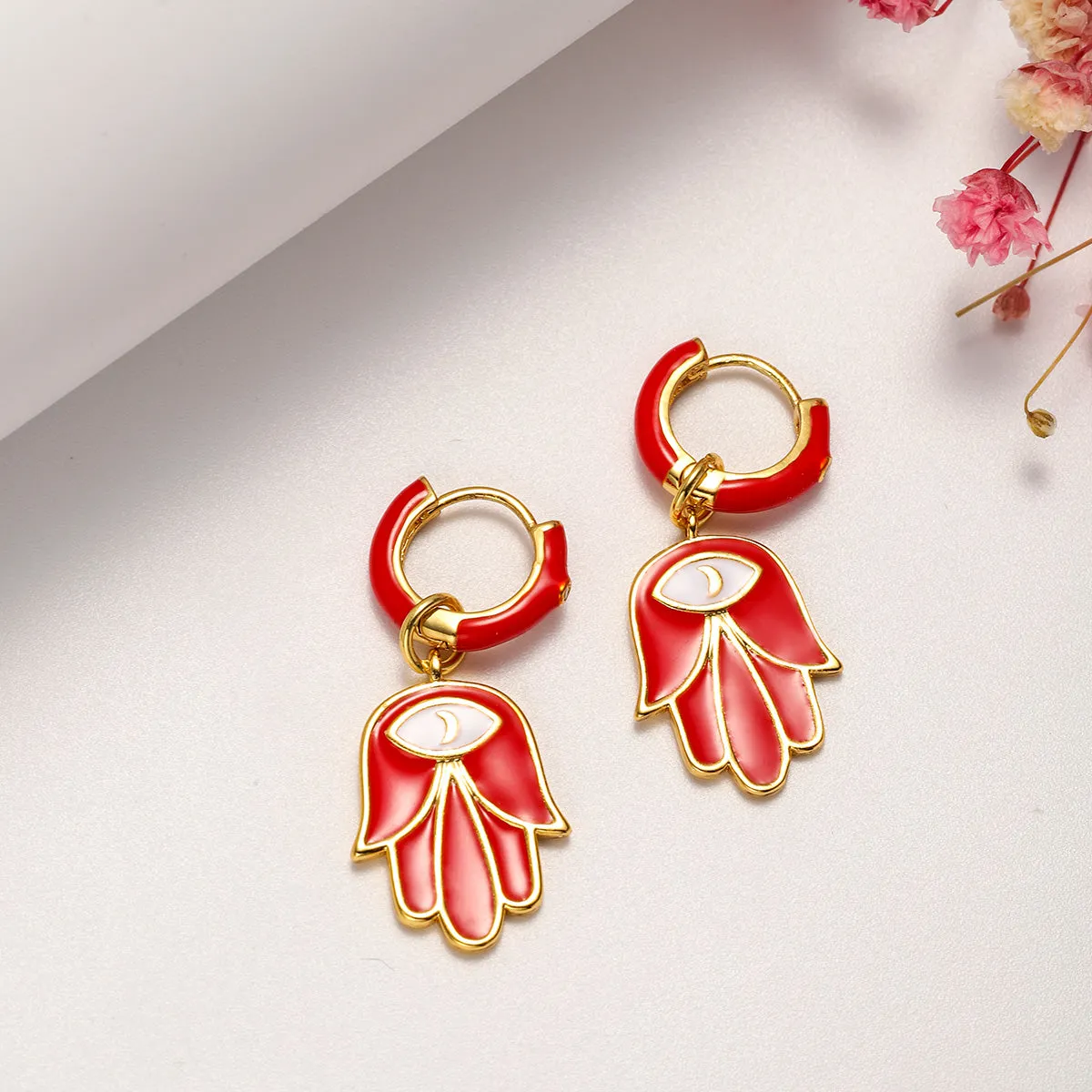 Eye in Hand Drop Earrings