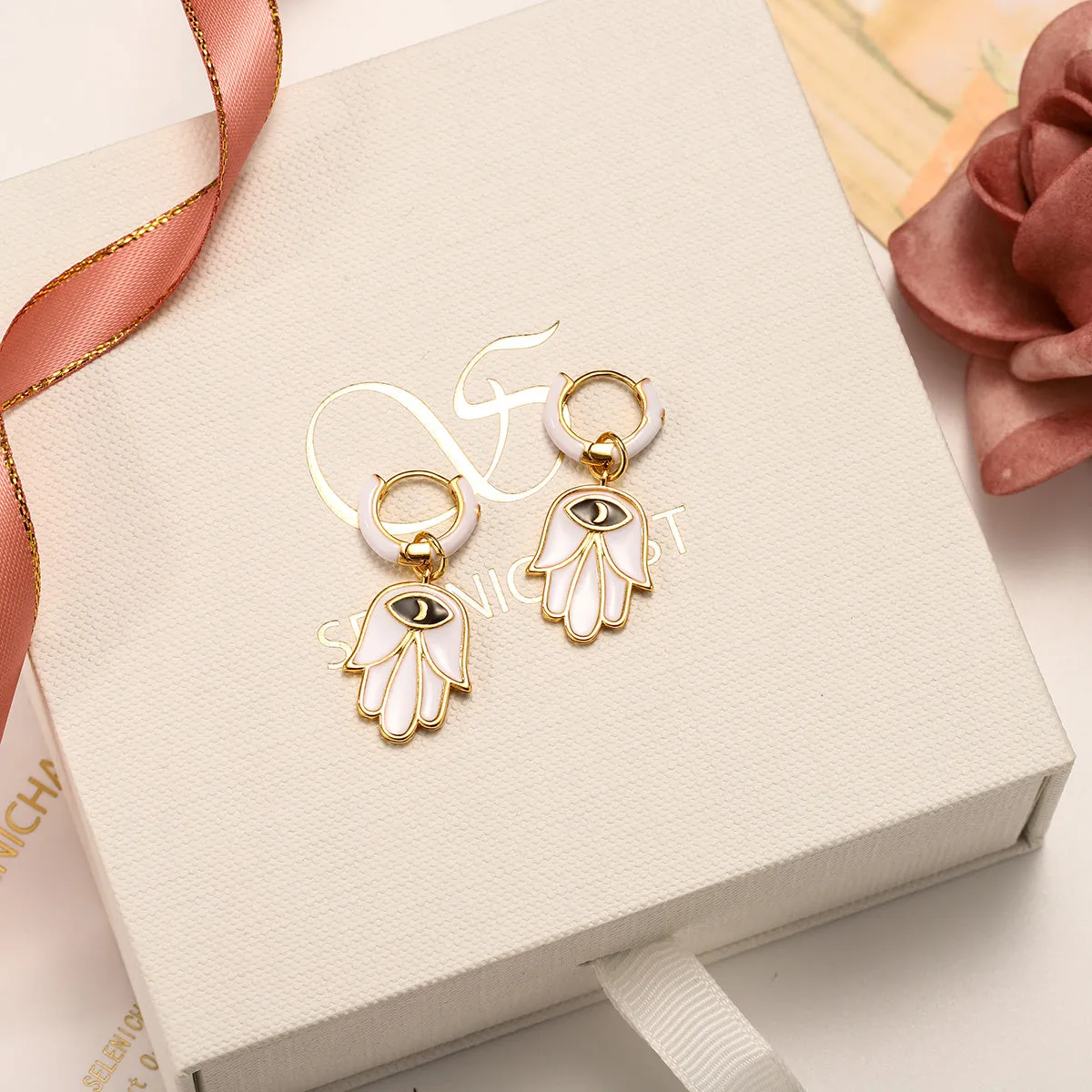 Eye in Hand Drop Earrings