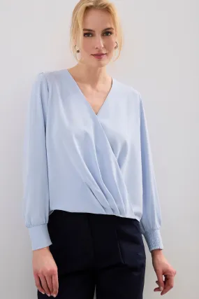 Long-sleeved blouse with a draped front