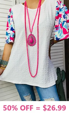 White textured blouse with flutter floral sleeves