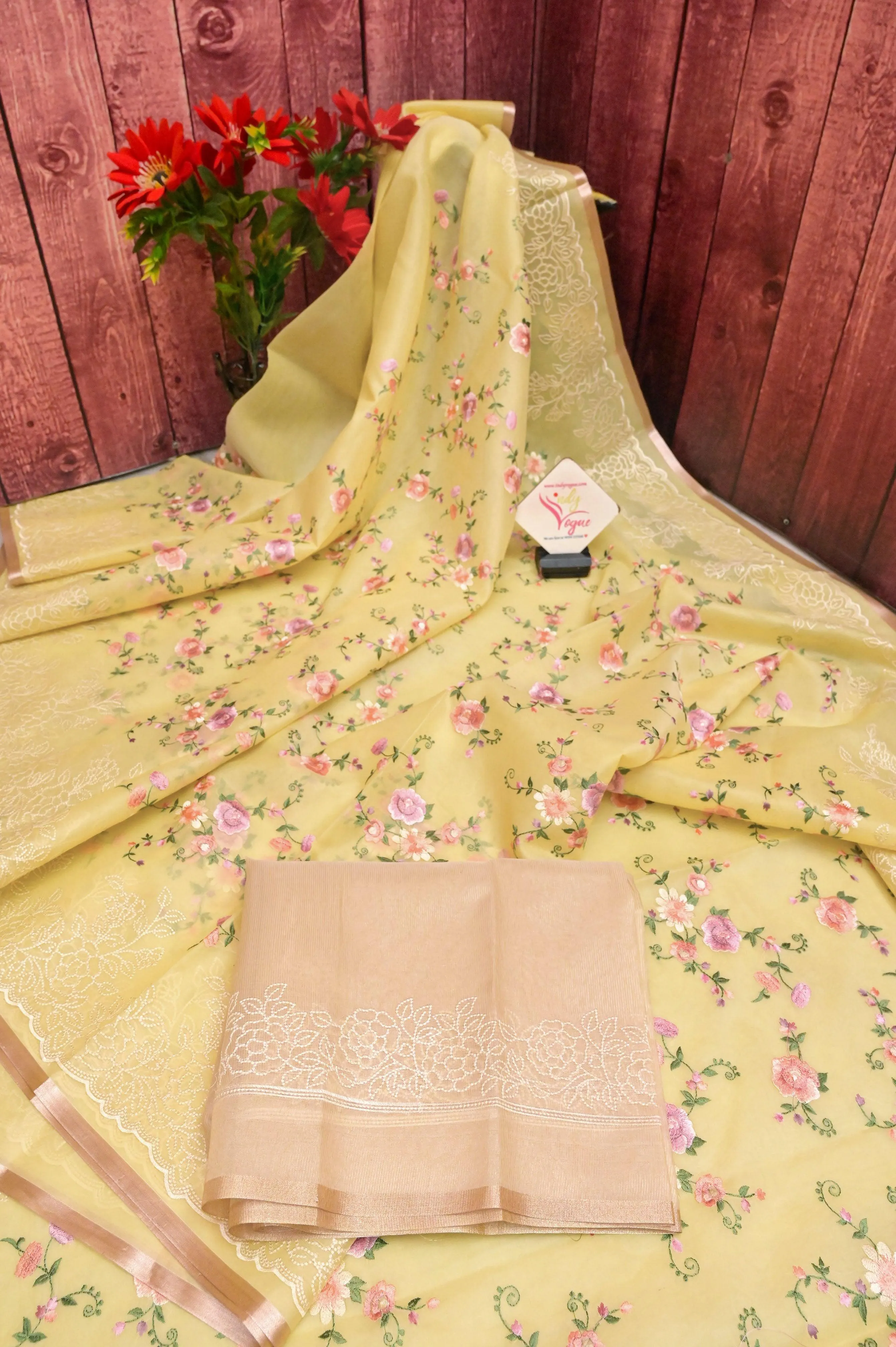 Yellow Organza Saree with Machine Embroidery